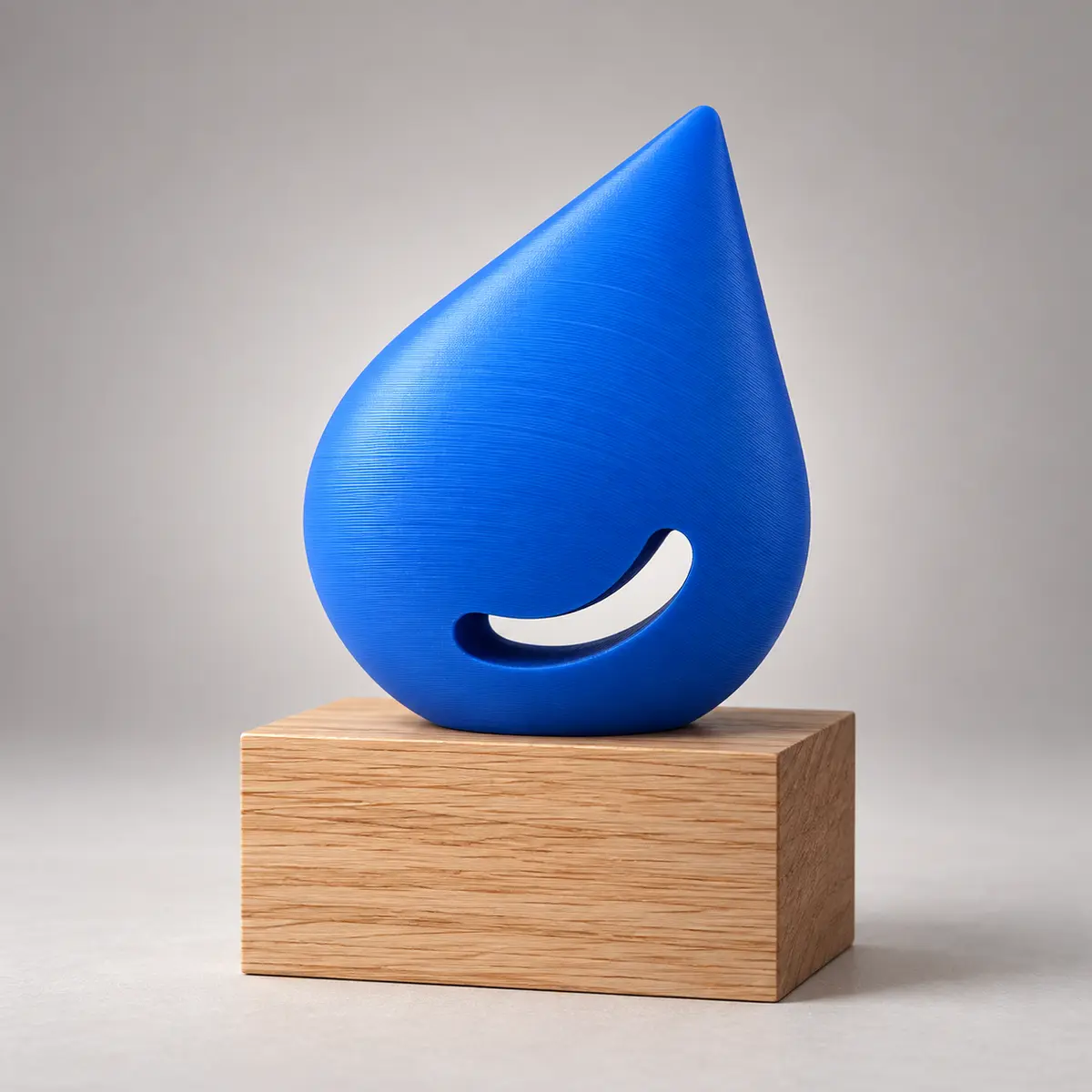 Gota 3D azul sobre base de madeira com mensagem de agradecimento pela parceria